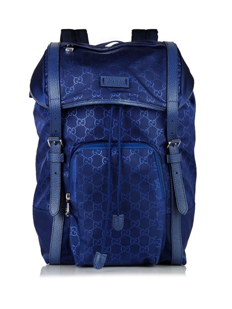 gucci travel backpack.